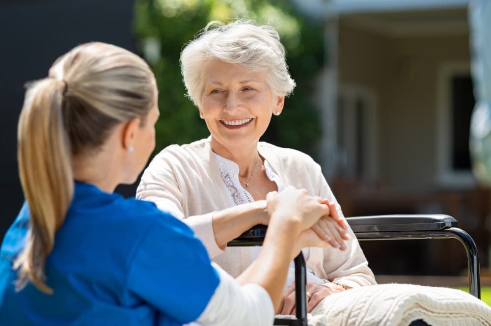 Nurse helping patient