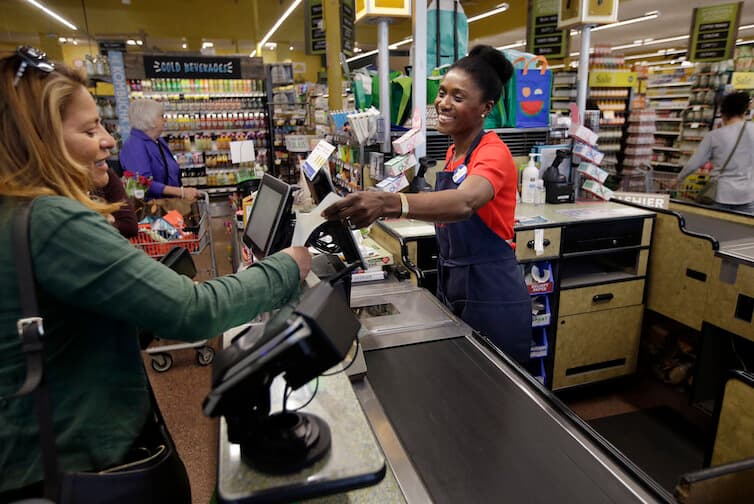 Retail staff at checkout